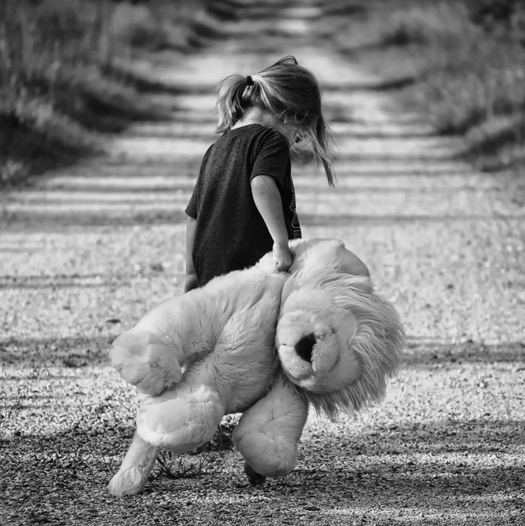 Early Maladaptive Schemas - Little Girl Holding Teddy Bear On a Road