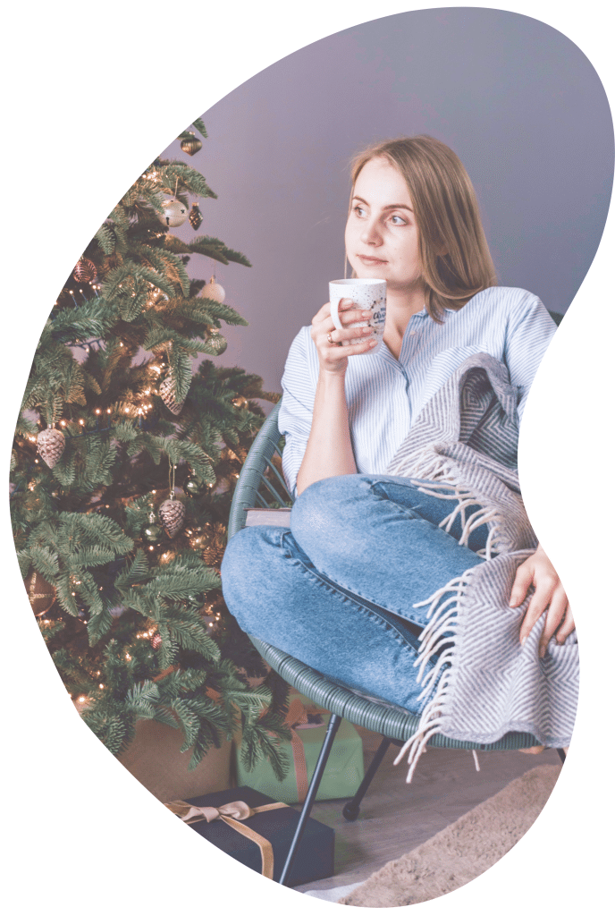 woman taking a break from socializing during holidays